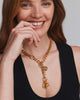 Raina Vintage Gold Charm Necklace