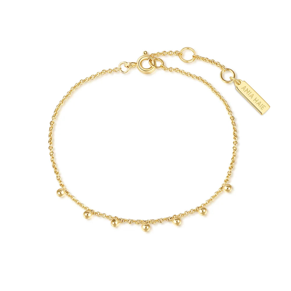 Gold Dangling Bead Station Bracelet