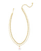 Deliah Gold Multi Strand Necklace in Iridescent Pink/White Mix